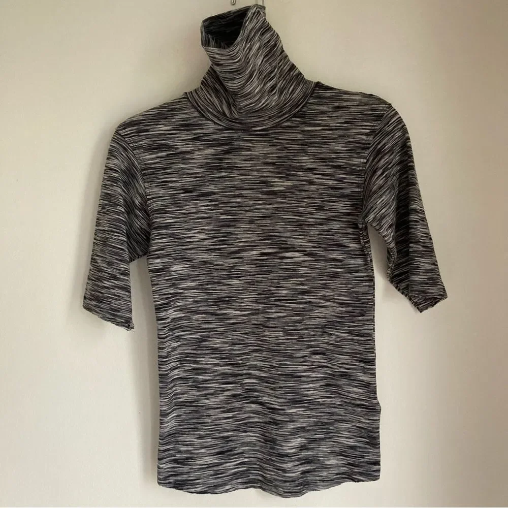 Free People Women Sunshine Space Dyed Turtleneck black & white size med. EUC!